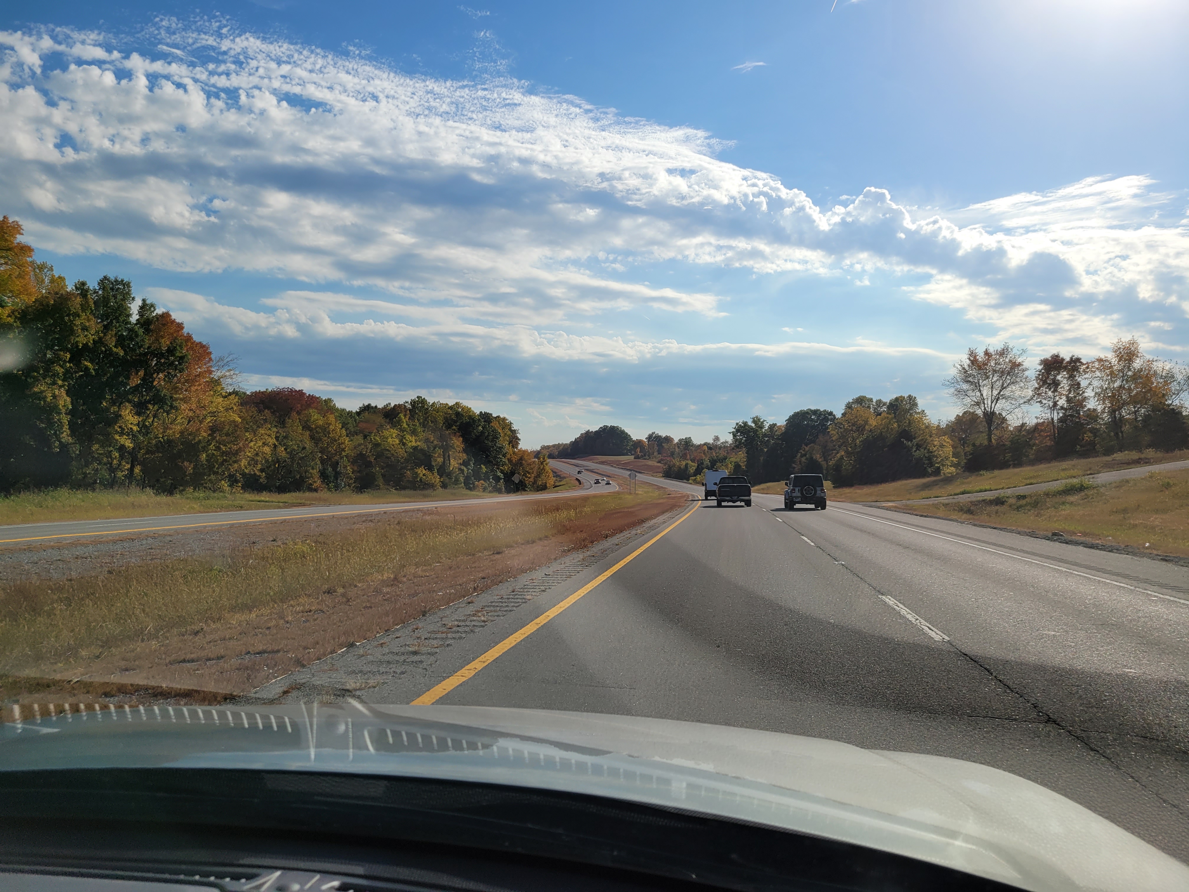 Tennessee SR-109, multilane highway with grass median, no curb and gutter, city of Portland, south of Academy Rd